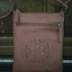 A Salmón colored purse that goes with anything!